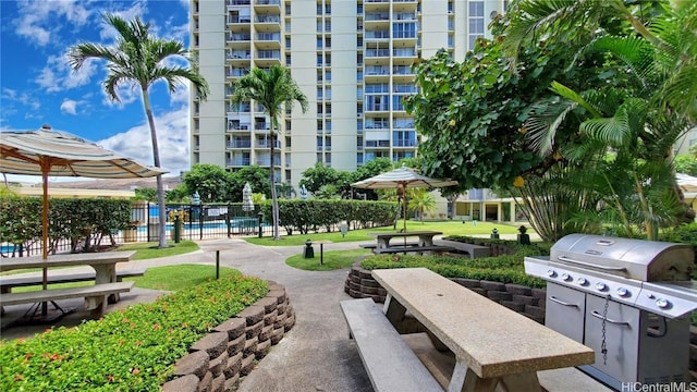 view of home's community featuring a pool