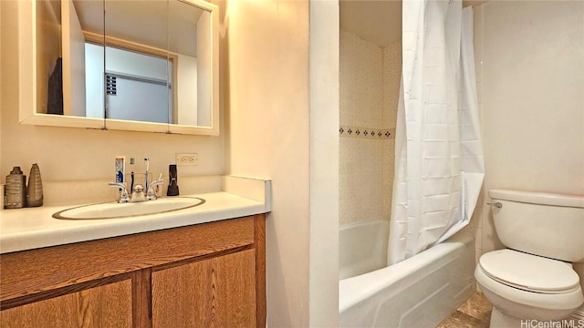 full bathroom featuring vanity, shower / bath combination with curtain, and toilet