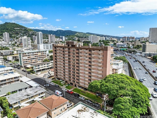 bird's eye view with a mountain view and a view of city