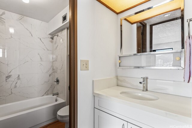 1415 Liholiho St Unit 909, Honolulu, HI 96822 - bathroom featuring vanity, toilet, and tub / shower combination