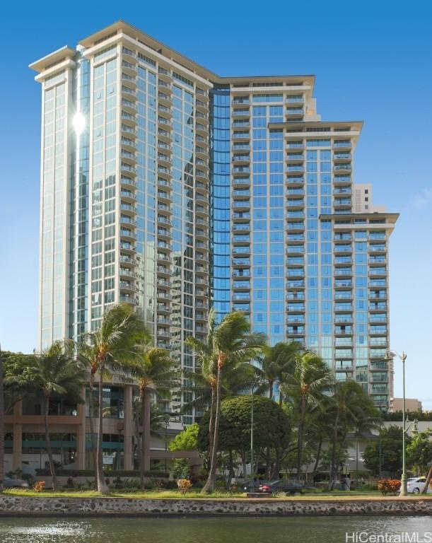 view of property with a water view