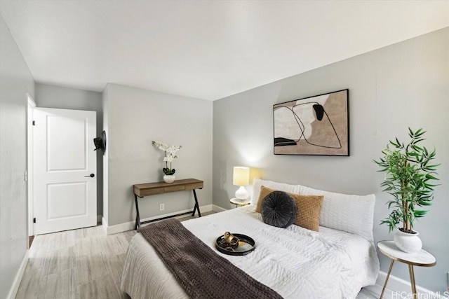 bedroom featuring light wood-type flooring