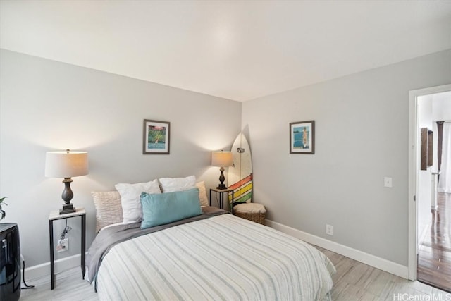 bedroom featuring light hardwood / wood-style flooring