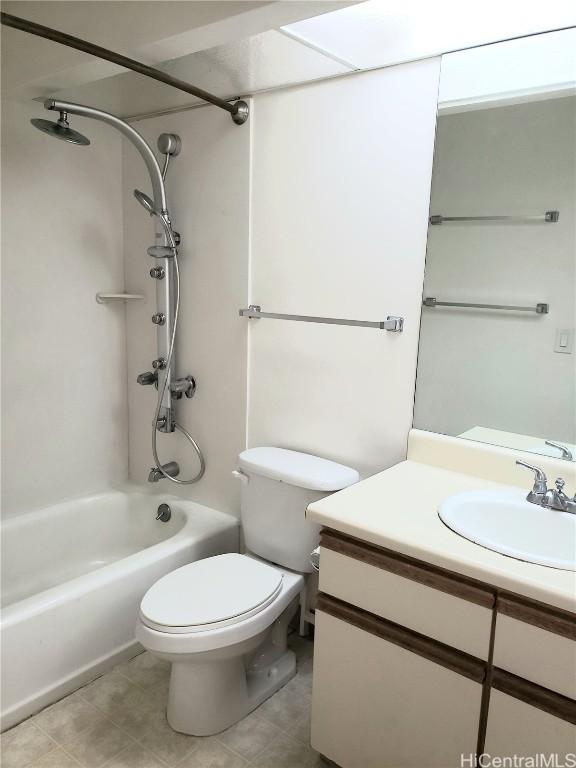 full bathroom with vanity, bathtub / shower combination, and toilet