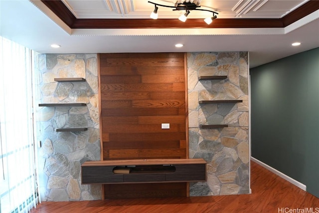 interior space featuring wood-type flooring and ornamental molding