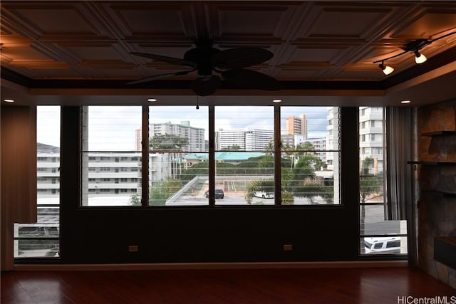 unfurnished room with ceiling fan and dark hardwood / wood-style floors