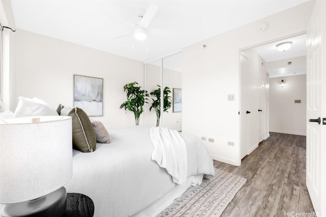 bedroom featuring ceiling fan and light wood-type flooring