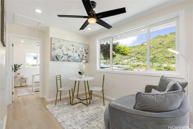 living area with light hardwood / wood-style floors