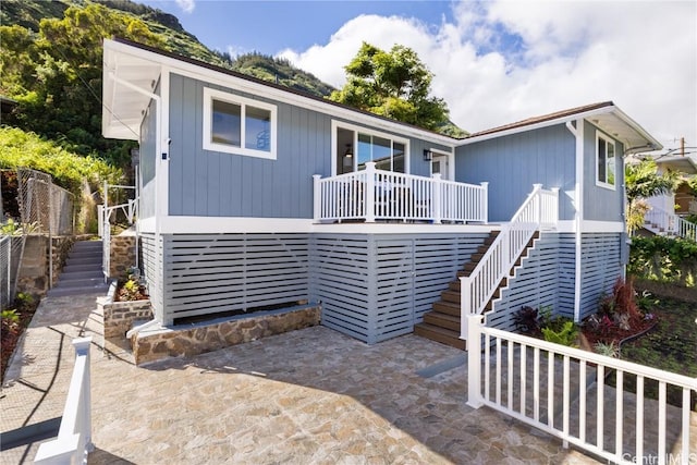 back of house with a patio area