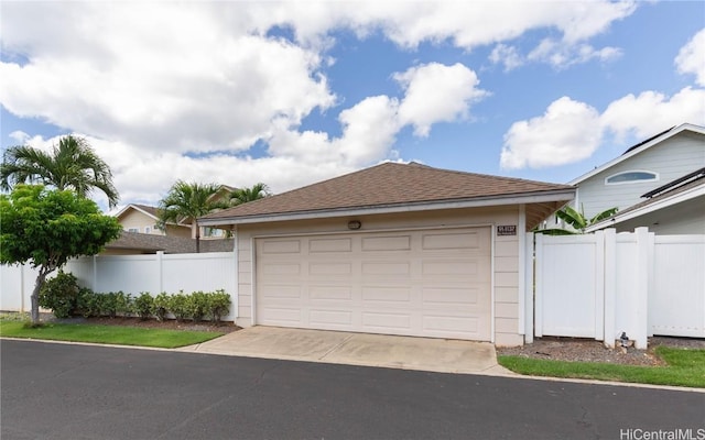 detached garage with fence