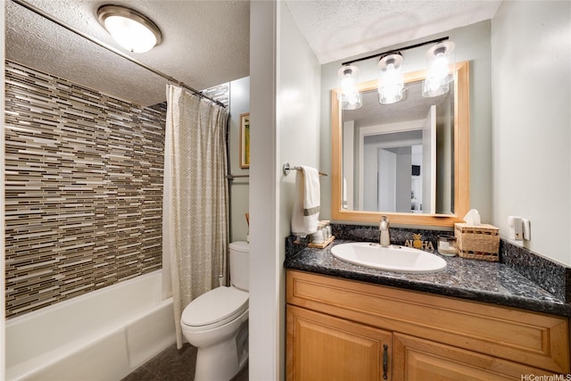 bathroom featuring shower / tub combo with curtain, vanity, a textured ceiling, and toilet