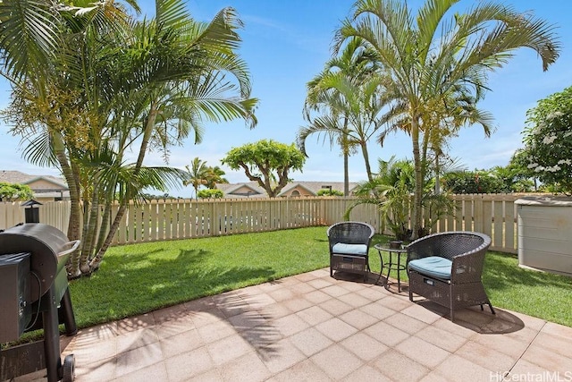 view of patio featuring a grill