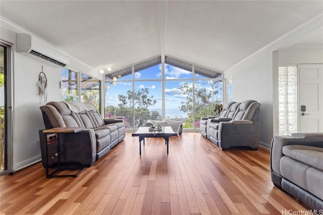 sunroom / solarium with lofted ceiling with beams and a wall mounted AC