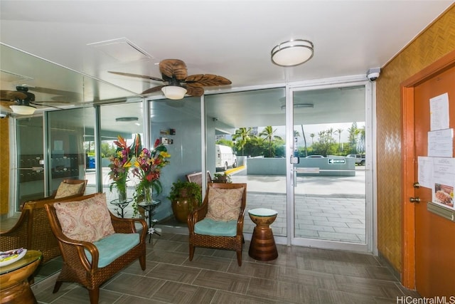 interior space featuring ceiling fan