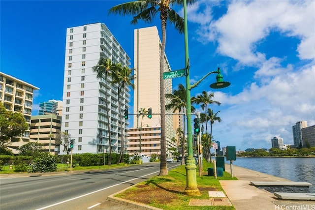 view of building exterior with a water view