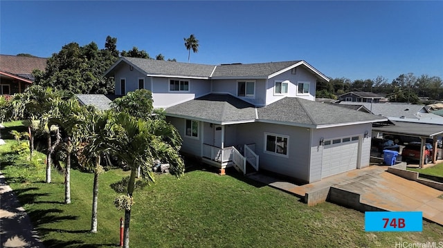 view of front of property with a garage and a front lawn