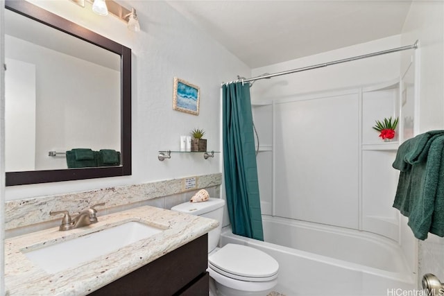 bathroom featuring vanity, toilet, and shower / tub combo with curtain