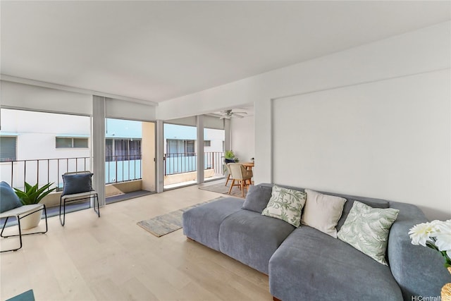 222 Kaiulani Ave Unit Ph4, Honolulu, HI 96815 - living room with wood finished floors and a ceiling fan