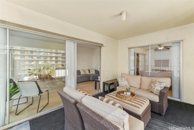 living room with ceiling fan