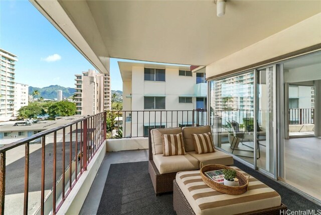 balcony featuring a mountain view