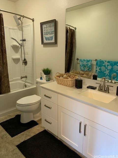 full bathroom with vanity, shower / bathtub combination with curtain, tile patterned floors, and toilet