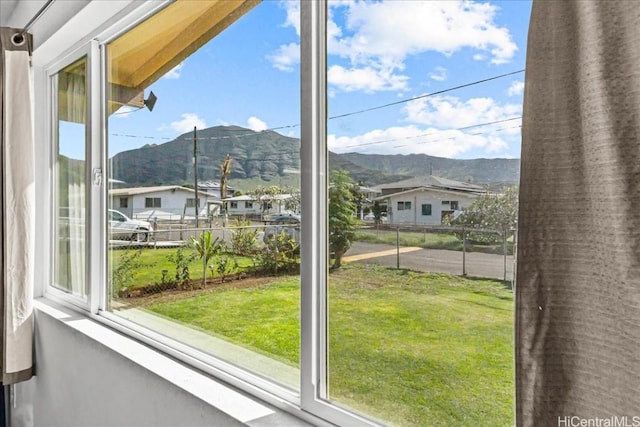 entryway featuring a residential view and a mountain view