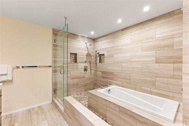 bathroom with independent shower and bath