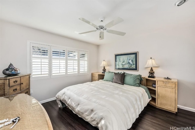 bedroom featuring dark wood-type flooring and ceiling fan