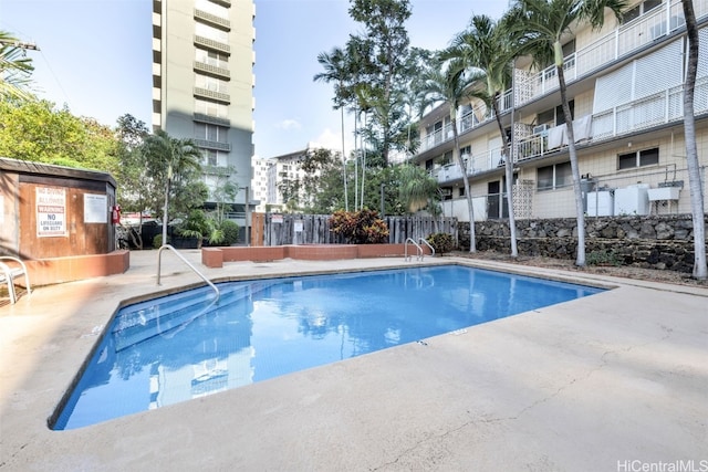 view of pool featuring a patio area