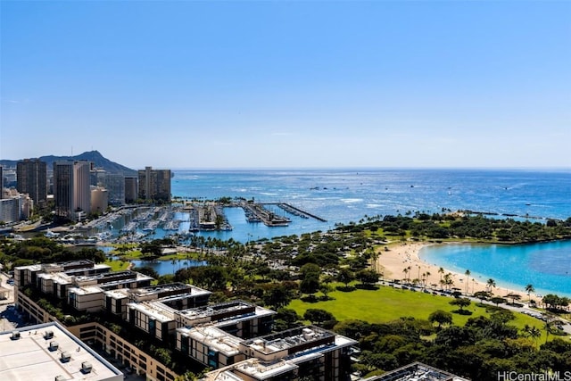 aerial view featuring a water view and a beach view