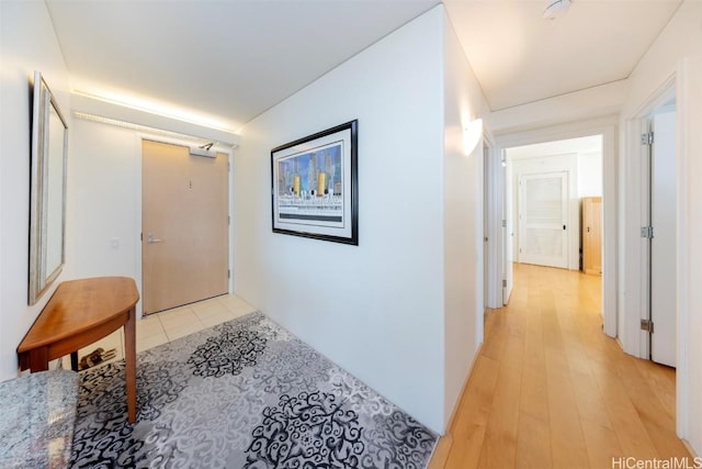 hallway with light wood-type flooring