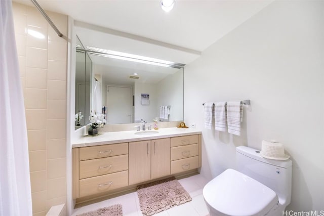 bathroom with tile patterned floors, vanity, toilet, and a shower with shower curtain