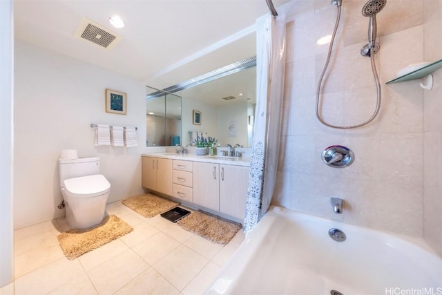 full bathroom featuring shower / bath combo, vanity, tile patterned floors, and toilet