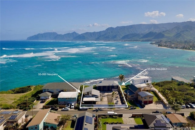 aerial view with a water and mountain view