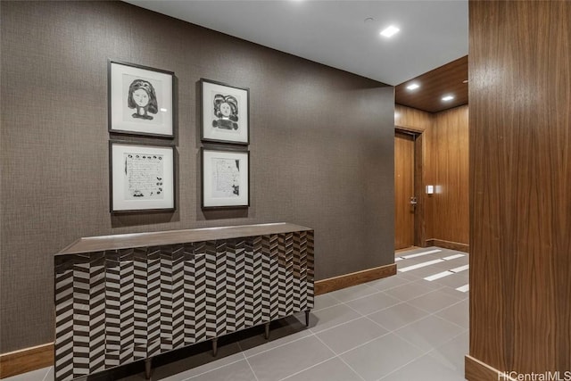 hallway with light tile patterned floors