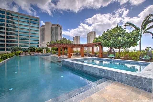 view of swimming pool with a pergola