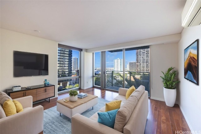 living room featuring dark hardwood / wood-style flooring, expansive windows, and a wall mounted AC