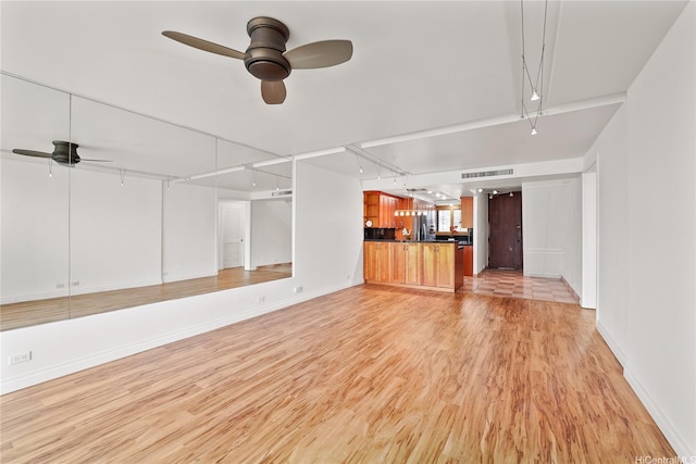 500 Lunalilo Home Rd Unit 28G, Honolulu, HI 96825 - unfurnished living room with baseboards, a ceiling fan, light wood finished floors, and visible vents