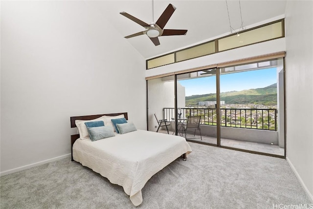 bedroom featuring access to exterior, carpet flooring, high vaulted ceiling, and baseboards