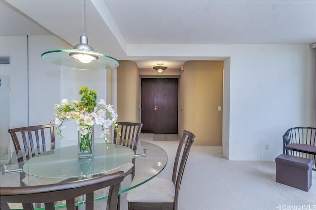 view of carpeted dining room