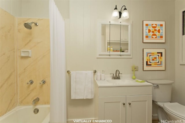 full bathroom with vanity, shower / bathtub combination, and toilet