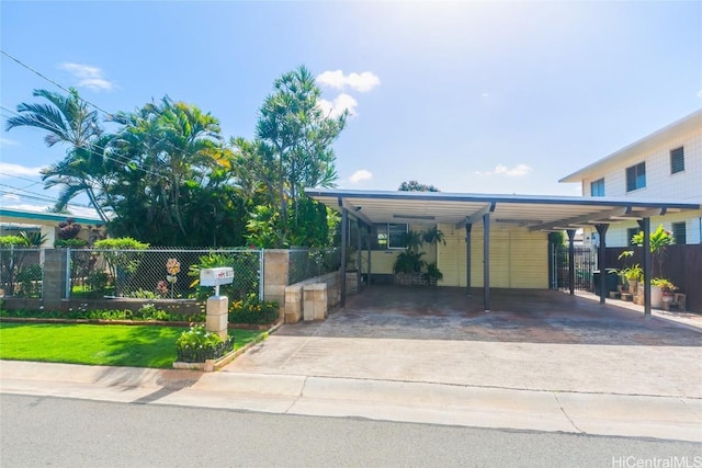 view of front facade with a carport