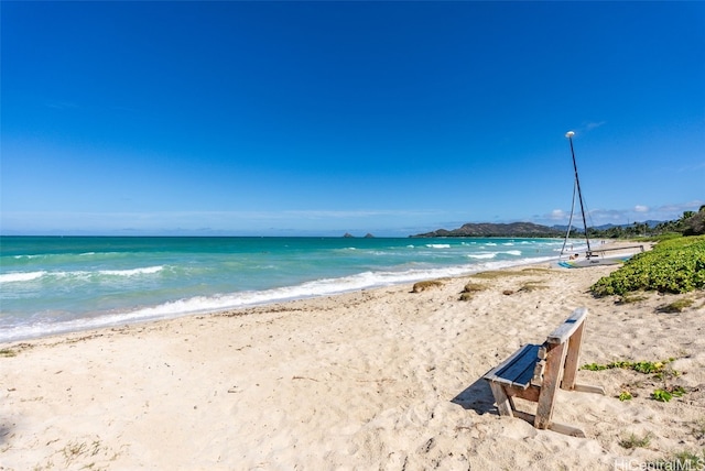 property view of water featuring a view of the beach