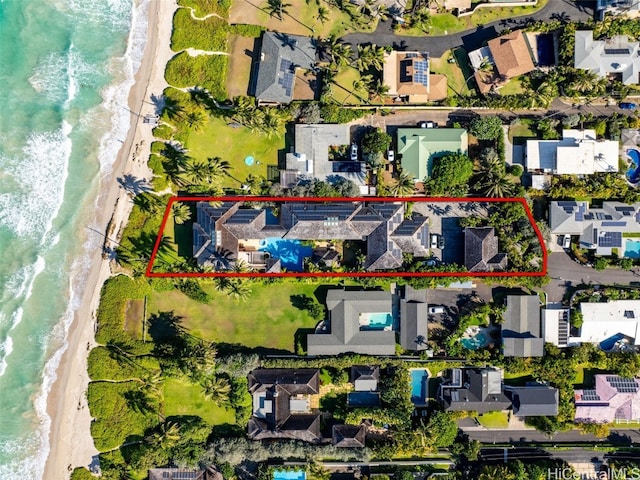 drone / aerial view with a view of the beach and a water view