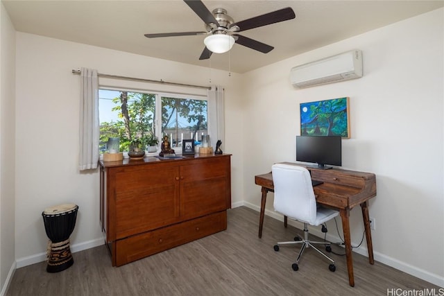 office with ceiling fan, hardwood / wood-style flooring, and a wall mounted AC