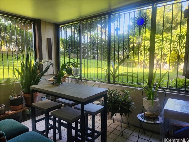 sunroom / solarium with a wealth of natural light