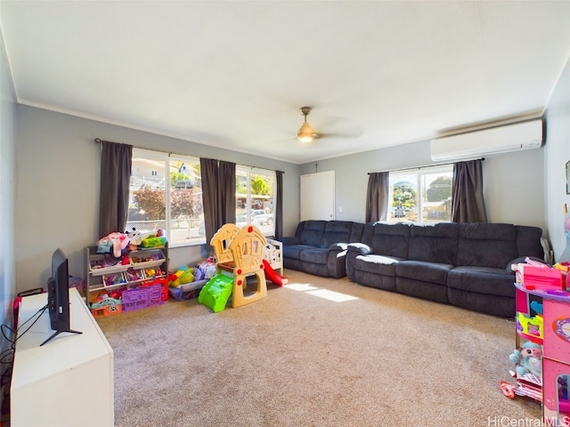 rec room featuring ceiling fan, carpet floors, ornamental molding, and a wall mounted AC