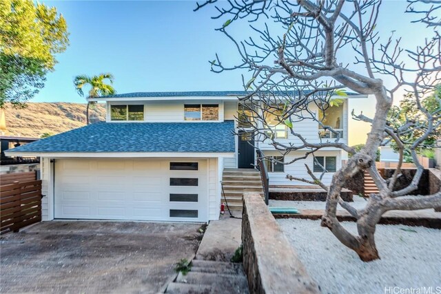 view of front of property with a garage