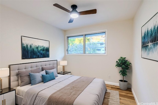 bedroom featuring ceiling fan and light wood-type flooring