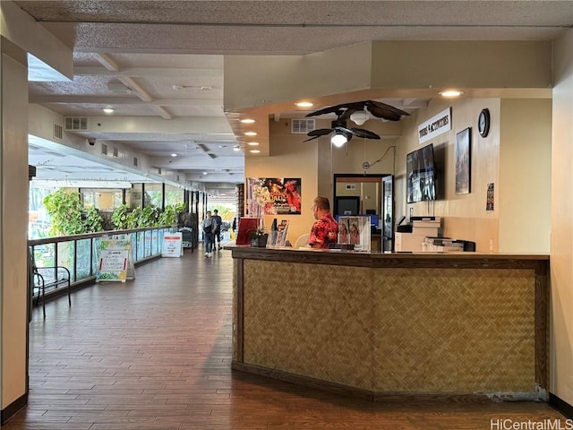 welcome area with visible vents and a ceiling fan